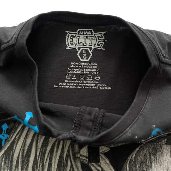 MMA Elite Skull Cross Wing Button Grunge Cyber Y2K Style T MMA Elite Skull Cross Wing Button Grunge Cyber Y2K Style T