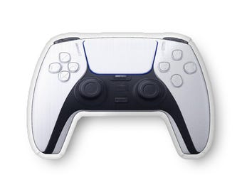 May include: A white and black video game controller with a symmetrical design. The controller features a central black panel with two joysticks, a directional pad, and various buttons. The controller has a blue accent and the word "MOTOMI" is printed on the center.