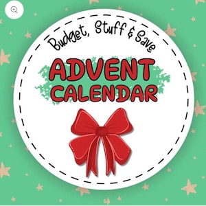 May include: A circular sticker with a white background and a dashed black border. The text reads Budget, Stuff & Save ADVENT CALENDAR in black and red lettering. A red bow is centred below the text, set against a green textured background.