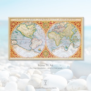 Può includere: Una mappa del mondo vintage con uno schema di colori rosso, oro e blu. La mappa è incorniciata in una cornice di legno chiaro. La mappa è intitolata "Orbis Terrae Compendiosa Descriptio".