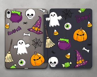 May include: Two Halloween-themed iPad cases with a variety of spooky designs, including ghosts, pumpkins, witches' hats, skulls, candy corn, and cauldrons. The text "Boo!" is printed on one of the cases.