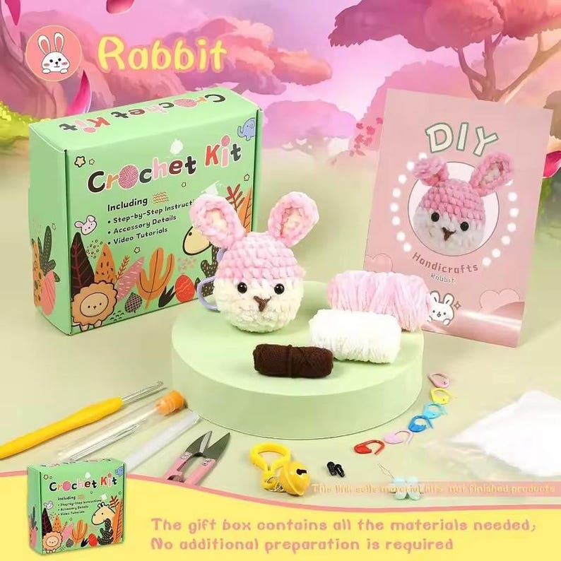 May include: A pink crochet rabbit DIY kit with all the materials needed to make a plush toy. The kit includes yarn, crochet hooks, needles, and instructions. The box says "Crochet Kit" and "Rabbit".