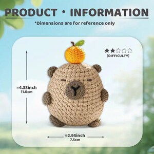May include: A crocheted bear with a small orange fruit on its head. The bear is tan with brown accents and a dark brown "Y" shape. The product dimensions are approximately 4.33 inches (11.0 cm) tall and 2.95 inches (7.5 cm) wide. The text "PRODUCT &bull; INFORMATION" is at the top.