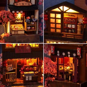 K&ouml;nnte beinhalten: Miniatur-Modelle japanischer Gesch&auml;fte mit komplizierten Details. Die Modelle zeigen traditionelle Architektur, beleuchtete Innenr&auml;ume und Kirschbl&uuml;ten-Akzente. Zu den Gesch&auml;ften geh&ouml;ren eine B&auml;ckerei, ein Ramen-Restaurant und ein Sushi-Restaurant.