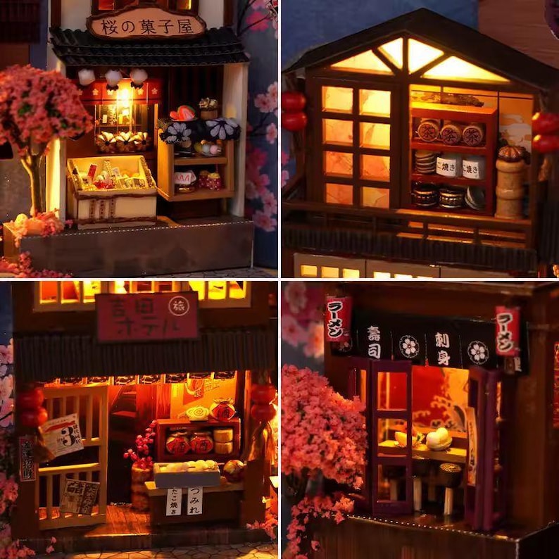 K&ouml;nnte beinhalten: Miniatur-Modelle japanischer Gesch&auml;fte mit komplizierten Details. Die Modelle zeigen traditionelle Architektur, beleuchtete Innenr&auml;ume und Kirschbl&uuml;ten-Akzente. Zu den Gesch&auml;ften geh&ouml;ren eine B&auml;ckerei, ein Ramen-Restaurant und ein Sushi-Restaurant.