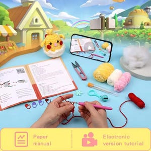 May include: A crochet kit with a yellow chick amigurumi pattern. The kit includes yarn, crochet hooks, stitch markers, a needle, and a bell. The kit also includes a paper manual and an electronic tutorial.
