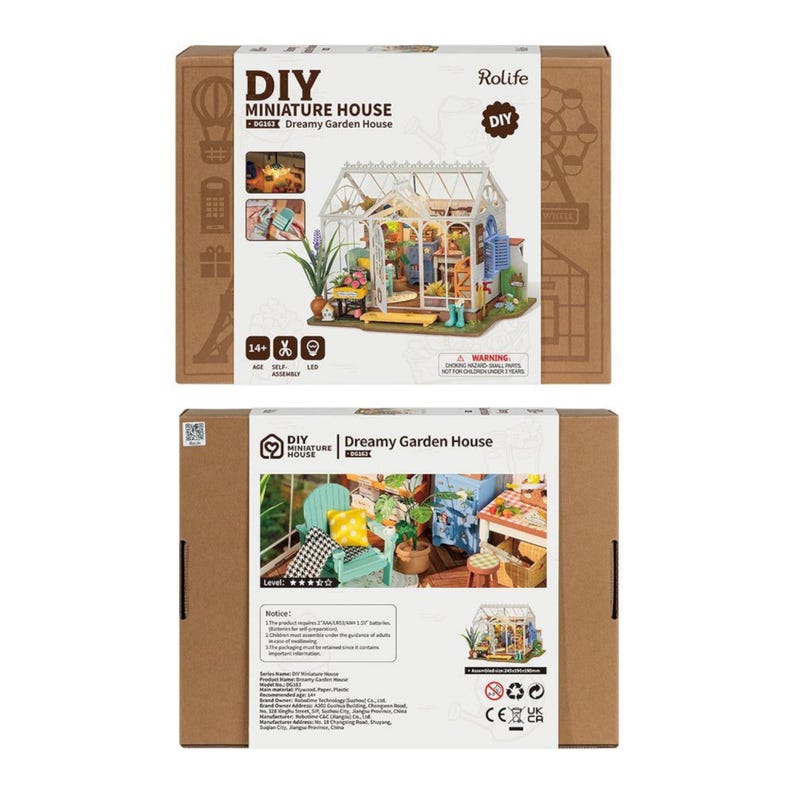 May include: A DIY miniature house kit, labeled "Dreamy Garden House," is displayed on a brown cardboard box. The box features an image of the completed miniature house, a detailed greenhouse with miniature furniture and plants. The kit includes LED lights and is for ages 14+.
