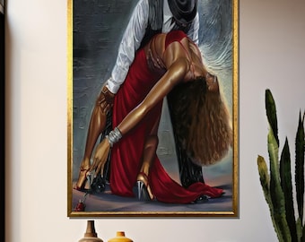 May include: A framed painting depicts a couple dancing. The woman wears a long red dress and gold heels, leaning back dramatically. The man, in a vest and hat, supports her. The artwork has a gold frame and is displayed on a wall.