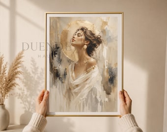 Puede incluir: Una impresión artística enmarcada que presenta a una mujer con los ojos cerrados, vestida con un vestido blanco y pendientes dorados. La obra de arte tiene un halo dorado y una paleta de colores neutros con texturas de pinceladas. El marco es dorado.