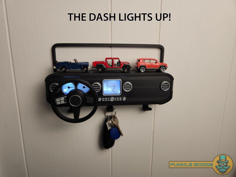 Show off your Jeep style with this fun and functional Duck Duck Jeep Display!

It holds 4 vending machine rubber ducks or 3 Hot Wheels cars, features a light-up front dash for extra flair, hidden storage for sunglasses or other small items, and 3 removable key hooks. Mount it on the wall or set it on a dresser or shelf—either way, it’s the perfect gift for Jeep lovers, Hot Wheels collectors, and ducking enthusiasts who want to organize in style!