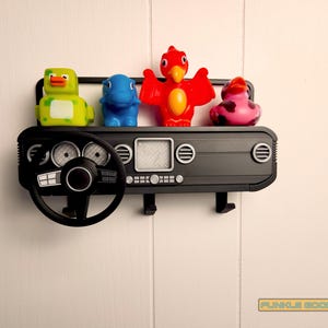 Show off your Jeep style with this fun and functional Duck Duck Jeep Display!

It holds 4 vending machine rubber ducks or 3 Hot Wheels cars, features a light-up front dash for extra flair, hidden storage for sunglasses or other small items, and 3 removable key hooks. Mount it on the wall or set it on a dresser or shelf—either way, it’s the perfect gift for Jeep lovers, Hot Wheels collectors, and ducking enthusiasts who want to organize in style!