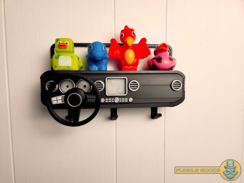 Show off your Jeep style with this fun and functional Duck Duck Jeep Display!

It holds 4 vending machine rubber ducks or 3 Hot Wheels cars, features a light-up front dash for extra flair, hidden storage for sunglasses or other small items, and 3 removable key hooks. Mount it on the wall or set it on a dresser or shelf—either way, it’s the perfect gift for Jeep lovers, Hot Wheels collectors, and ducking enthusiasts who want to organize in style!