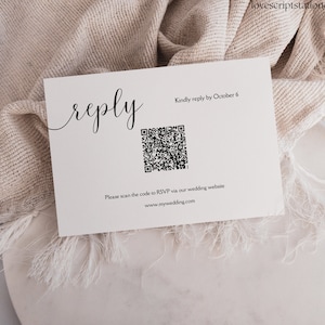 May include: A white reply card featuring the word "reply" in cursive script. The card includes a QR code and the text "Kindly reply by October 6." It also says "Please scan the code to RSVP via our wedding website www.mywedding.com."