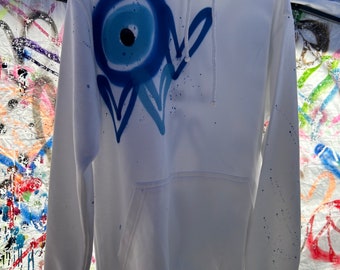 Children’s spray painted evil eye hoodies