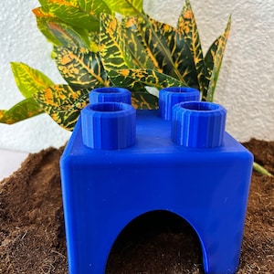 Bloque de juguete para esconder criaturas