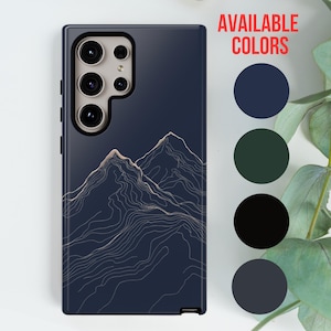 May include: A phone case with a dark blue background and a design of white mountains with contour lines. The case is available in five colors: navy blue, dark green, black, and two shades of gray.  AVAILABLE COLORS is written in white text at the top of the image.
