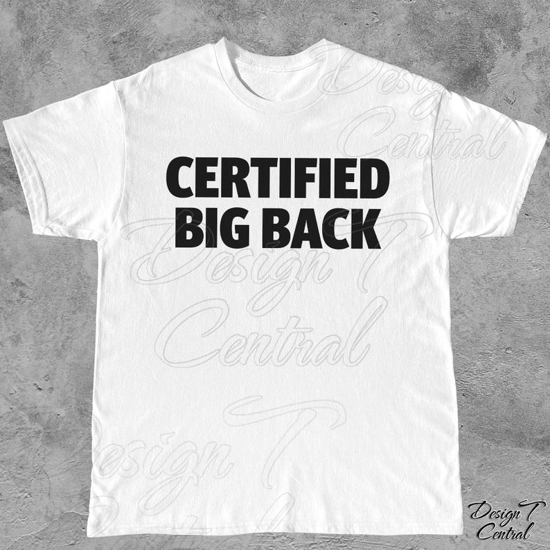 May include: White t-shirt featuring the text "CERTIFIED BIG BACK" in bold, black lettering. The shirt has a crew neck and short sleeves. The design is centered on the front of the garment.