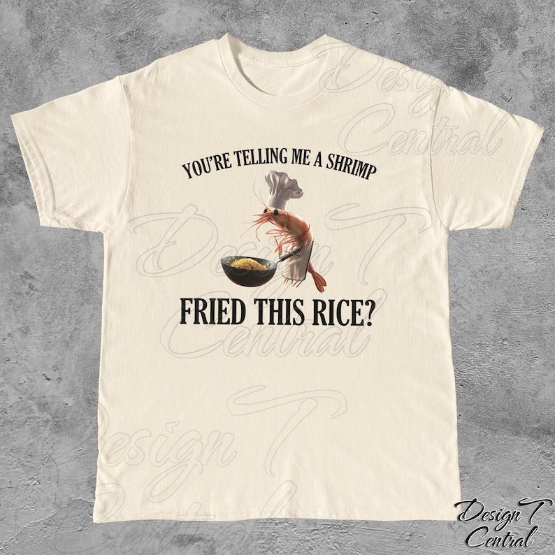 May include: A white t-shirt with the text "You're telling me a shrimp fried this rice?" and a cartoon shrimp wearing a chef's hat and holding a pan of rice.