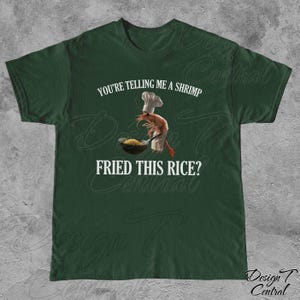 May include: A green t-shirt with the text "You're telling me a shrimp fried this rice?" in white. A cartoon shrimp wearing a chef's hat is holding a spatula over a pan of rice.