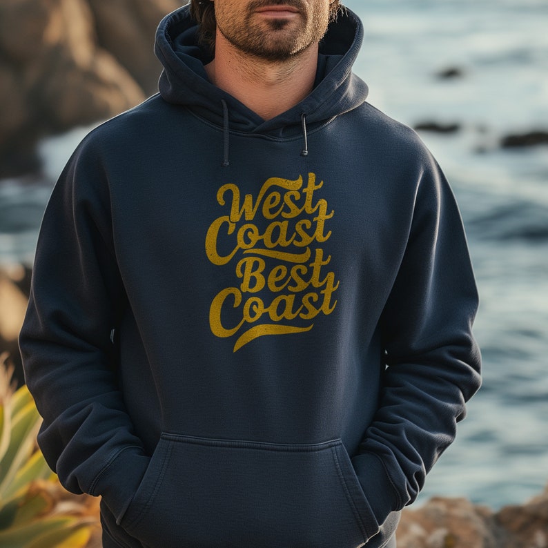 May include: A navy blue hoodie with a gold graphic that says "West Coast Best Coast".