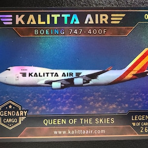 May include: A rectangular trading card featuring a Kalitta Air Boeing 747-400F cargo plane flying above clouds. The card has a holographic finish with text including KALITTA AIR, LEGENDARY CARGO, QUEEN OF THE SKIES, and the website www.kalittaair.com.