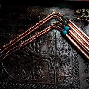 Handmade custom dowsing rods for spirit communication with crystal and metaphysical properties.Dowsing for finding buried treasure & water