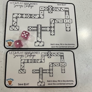 May include: Two white cards with black dominoes and the text "Let's Play Some Bones Savings Challenge" and "Save $147".  The cards have instructions to roll two dice, fill in the domino, and save the combined amount.