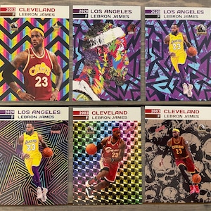 Lote de 6 tarjetas de baloncesto de LeBron James: novato de los Cleveland Cavaliers (2003) y tarjetas de los LA Lakers (2020).