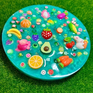 Farmers Market Picky Pad for Skin Picking & Stress Relief, Close-Up of Bead-Filled Sensory Fidget Pad with Fruit & Veggie Charms, Silicone Picking Pad with Farm Colors & Scented Berry Infusion, Anxiety & Nail Biting Relief Picky Pad with Beads & Farm-Fresh Accents, Fidget Pick Pad for ADHD, OCD & Farmers Market Lovers, beads, stimming, skin picking pad, ocd, fine motor activity, picking toy, fruit sensory toy, scented fidget, farm-themed fidget