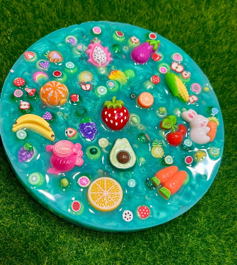 Farmers Market Picky Pad for Skin Picking & Stress Relief, Close-Up of Bead-Filled Sensory Fidget Pad with Fruit & Veggie Charms, Silicone Picking Pad with Farm Colors & Scented Berry Infusion, Anxiety & Nail Biting Relief Picky Pad with Beads & Farm-Fresh Accents, Fidget Pick Pad for ADHD, OCD & Farmers Market Lovers, beads, stimming, skin picking pad, ocd, fine motor activity, picking toy, fruit sensory toy, scented fidget, farm-themed fidget
