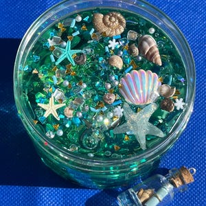 Message in a Bottle Slime: Green Clear Slime with Ocean Charms