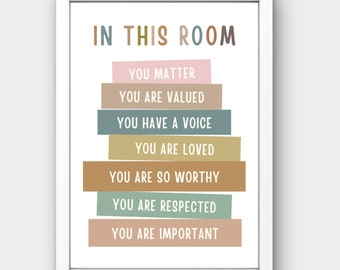 May include: A white framed print with the text "IN THIS ROOM" in colorful letters. The text is stacked in a staircase pattern with the following text: "YOU MATTER", "YOU ARE VALUED", "YOU HAVE A VOICE", "YOU ARE LOVED", "YOU ARE SO WORTHY", "YOU ARE RESPECTED", "YOU ARE IMPORTANT". The bottom of the print has the text "ALAMO PRINTS - printable art collection - "