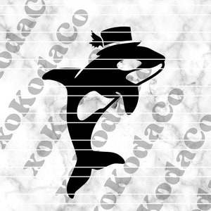 May include: A black silhouette of an orca wearing a hat with a feather. The orca is jumping out of the water with its mouth open.