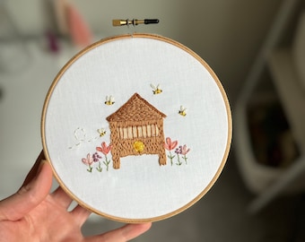 Embroidered beehive with flowers