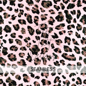May include: A seamless pattern with a pink backdrop and dark brown and black leopard print spots. The word "SEAMLESS" is at the bottom. The design is by "Tasty Leaf Designs".