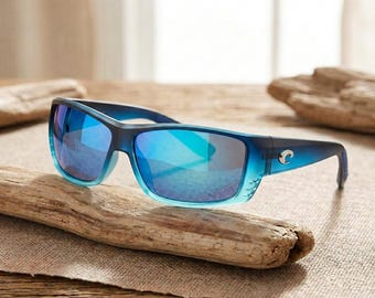 New Costa Del Mar Cat Cay Polarized Sunglasses Gradient Blue Fade Frame with Blue Mirror Lenses Vented Sport Fishing Sunglasses