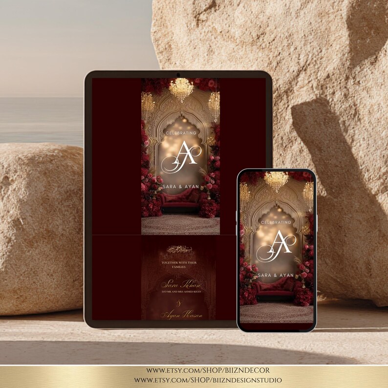 May include: A tablet and a smartphone displaying a digital wedding invitation design featuring a dark red background, an ornate archway, gold chandeliers, and deep red floral arrangements. The text reads Celebrating, A and J, Sara and Ayan.