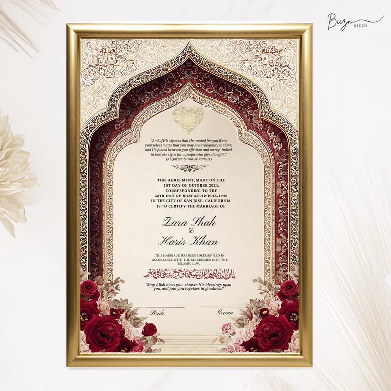 May include: A framed marriage certificate with a gold border. The certificate features ornate burgundy and gold designs, floral accents, and the names Zara Shah and Haris Khan. The text includes the date and location of the marriage.