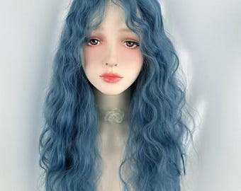 May include: A long, wavy blue wig with a side part. The wig is styled with loose, flowing curls.