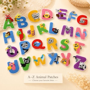 May include: A collection of twenty-six embroidered alphabet patches, each featuring a different animal integrated into the letter design. The patches are multicolored and include letters A through Z. A rectangular sign reads A-Z Animal Patches.