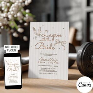 May include: A bridal shower invitation with the text "Lagree with the Bride". The invitation includes details for Camille's bridal shower, with a mobile version displayed on a smartphone. The design features ballet shoes and a bow. The invitation is on a wooden surface.