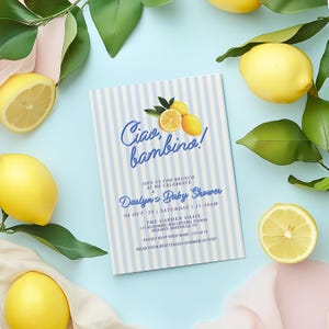 May include: A blue and white striped baby shower invitation with the text "Ciao bambino!" and lemons. The invitation is for Darlyn's Baby Shower on October 25th at 11:30 AM at The Garden Oasis.