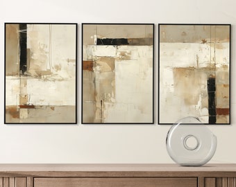 May include: A set of three abstract art prints with a beige, brown, and black color scheme. The prints are framed in black and feature geometric shapes and lines.