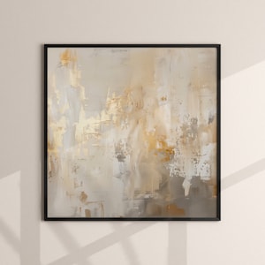Op de afbeelding: Abstract schilderij in tinten beige, bruin en goud met een zwarte lijst. Het schilderij heeft een textuur, penseelstreek effect.
