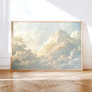 May include: A framed print of a painting depicting a sky filled with fluffy white clouds. The clouds are illuminated by a soft, golden light, creating a sense of peace and tranquility.