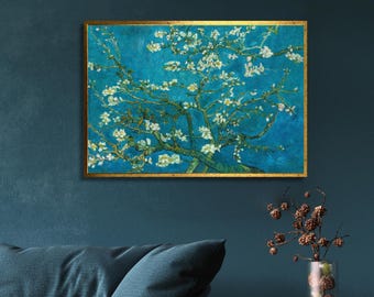 May include: A painting of a blossoming almond tree with white flowers against a blue sky. The painting is in a gold frame.