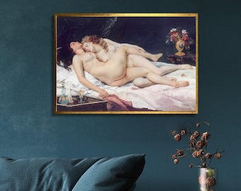 May include: A framed painting depicting two nude figures reclining on a bed. The artwork features soft colors, a gold frame, and a still life of flowers and a tray with a bottle and glasses. The painting is displayed on a dark teal wall.