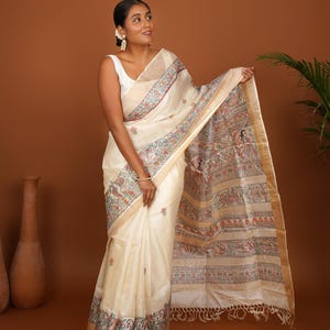 Nritya in Nature Saree – A Madhubani Masterpiece Off White Saree
