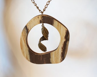 necklace made of wood and veneer with metal elements