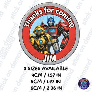 Op de afbeelding: Een ronde sticker met de Transformers-personages Bumblebee en Optimus Prime. De sticker heeft een rode rand met de tekst "Thanks for coming" en de naam "JIM". Verkrijgbaar in 3 maten: 4cm, 5cm en 6cm.